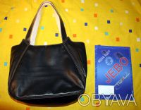 Элегантная новая фирменная женская сумка из кожзаменителя, широкая, цвет – черны. . фото 4