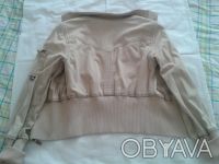 Продам моднявую короткую(до талии)курточку на стройную девушку,р.152-164,цвет-ко. . фото 6