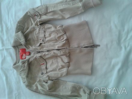 Продам моднявую короткую(до талии)курточку на стройную девушку,р.152-164,цвет-ко. . фото 1