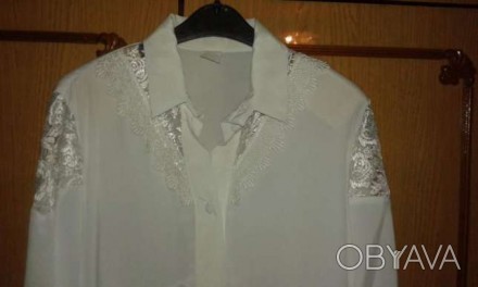 Блузка шелковая белая ,с кружевными вставками .
Больше фото в смс , на сайт не . . фото 1