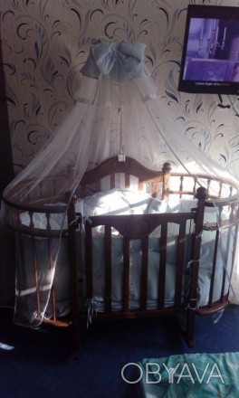 Детская кроватка в отличном состоянии, пользовались около года. Сын спать там не. . фото 1