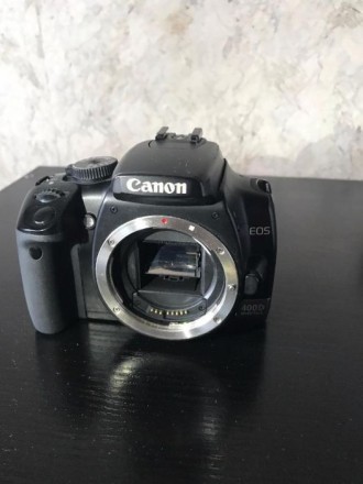 Продам фотоаппарат Canon EOS 400D + объектив Canon 28/200 mm состояние на тверду. . фото 6
