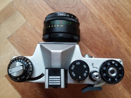 Продам полностью рабочий пленочный фотоаппарат Зенит ET с родным чехлом и коробк. . фото 6
