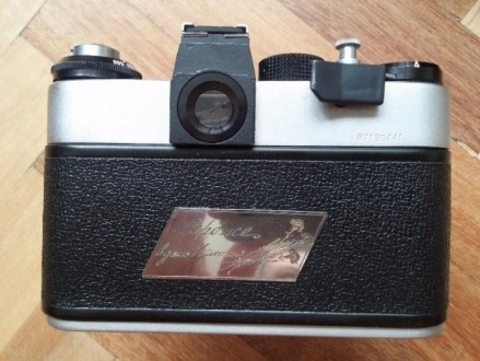 Продам полностью рабочий пленочный фотоаппарат Зенит ET с родным чехлом и коробк. . фото 5