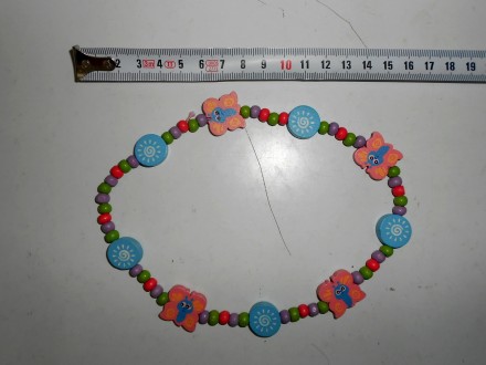 Оригинальное деревянное детское разноцветное ожерелье.. . фото 3