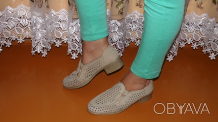 Летние туфли с перфорацией Rieker, Германия
цвет серо-бежевый
натуральная кожа. . фото 1