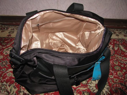 Женская сумка новая.
Качество техткань (плащевка), кожзам
Размеры: высота: 32 . . фото 3
