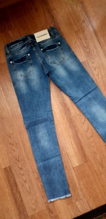 Стильні, універсальні, майже нові жіночі джинси.. . фото 6