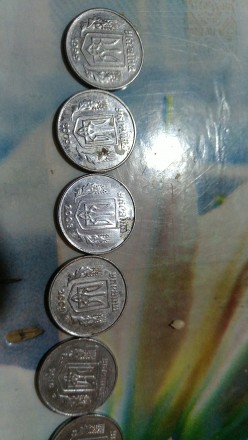 Продам монеты Украины 1,2,5,10,25,50 копеек и 1 гривня
1 коп- 1992, с 2000-по 2. . фото 9