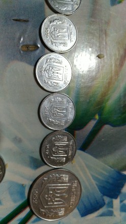 Продам монеты Украины 1,2,5,10,25,50 копеек и 1 гривня
1 коп- 1992, с 2000-по 2. . фото 8
