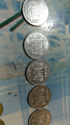 Продам монеты Украины 1,2,5,10,25,50 копеек и 1 гривня
1 коп- 1992, с 2000-по 2. . фото 7