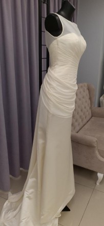 Свадебное платье классическое со складками и сборкой
Плотная основная ткань, шиф. . фото 2
