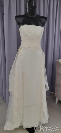 
Свадебное платье из натурального шёлка с кружевом и двойным шлейфом
Кружевной в. . фото 1