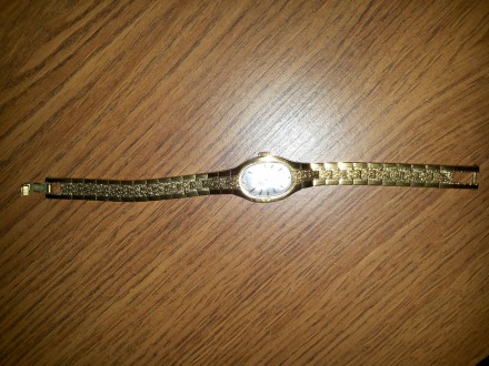Часы женские с позолоченным браслетом механика.. . фото 2
