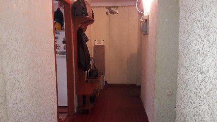 Комната в коммуналке в хорошем состоянии,не угловая,новая сан.техника,новые двер. . фото 4