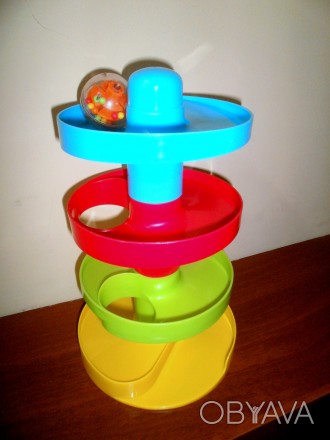 Розвиваюча іграшка "Гірка-спіраль", Помістіть кульку на верхню чашу і спостеріга. . фото 1