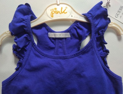 Синяя стильная майка с оборками от американского бренда Guess в размере 8(128).
. . фото 4