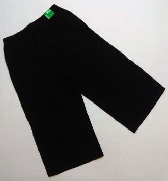 Черные легкие кюлоты от итальянского бренда Benetton для девочки в размере 13-14. . фото 3