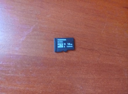 Недорого продам флешку Micro SD 16 Gb TOSHIBA..Флешка долго лежала без надобност. . фото 2