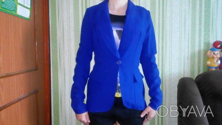 Продам пиджак женский новый,цвет электрик.Пиджак ни разу не одевался.. . фото 1