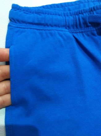 Синие однотонные шорты от итальянского бренда Fagottino для мальчика в размере 9. . фото 4