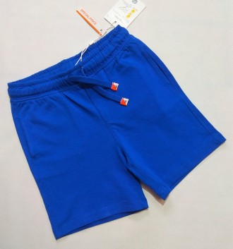 Синие однотонные шорты от итальянского бренда Fagottino для мальчика в размере 9. . фото 2