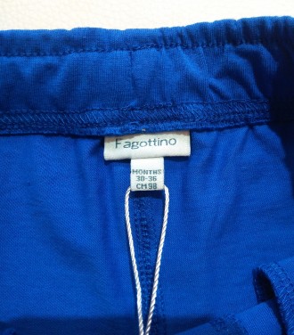 Синие однотонные шорты от итальянского бренда Fagottino для мальчика в размере 9. . фото 5