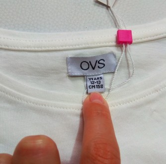 Молочная футболка с блестящей надписью от итальянского бренда OVS в размере 12-1. . фото 4