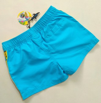 Яркие голубые шорты - плавки для мальчика от Maui Kids в размере 7-8 лет.
Внутр. . фото 3