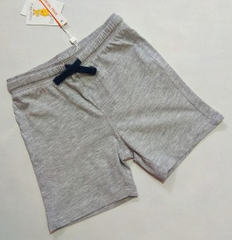 Серые однотонные шорты от итальянского бренда Fagottino для мальчика в размере 9. . фото 2