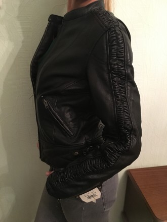 Натуральная кожаная куртка американской фирмы,специализирующейся на производстве. . фото 4