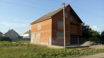 Недостроенный дом (коробка под крышей) размер 11х12, в доме: гараж, действующая . Вилок. фото 3