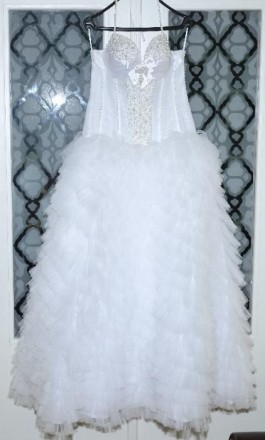 Платье в идеальном состоянии, одевалось на пару часов фотосессии. Не венчанное. . . фото 4