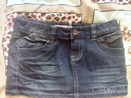 Коротка джинсова юбки, колір темно-синій, р.s. . фото 1