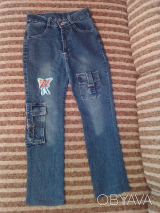 джинсы стрейч на девочку 6-8 лет, состояние хорошее без дефектов.. . фото 1