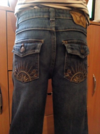 джинсы на девочку 8-9 лет, состояние хорошее без дефектов!. . фото 4