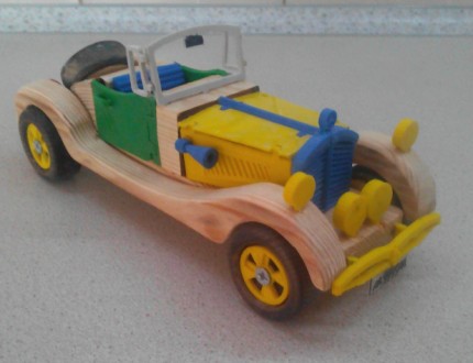 Данная модель игрушки сделана  из  дерева и ABS пластика, колеса  выполнены из  . . фото 2