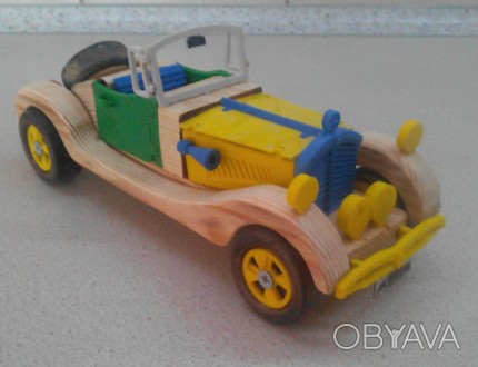 Данная модель игрушки сделана  из  дерева и ABS пластика, колеса  выполнены из  . . фото 1