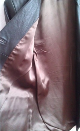 Кожаный пиджак Crossbow London
44

Кожаный пиджак темно-коричневого цвета.

. . фото 5