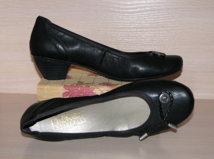 Новые элегантные туфли немецкой фирмы Rieker на удобном каблуке.

Бренд: Rieke. . фото 4