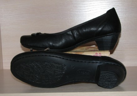 Новые элегантные туфли немецкой фирмы Rieker на удобном каблуке.

Бренд: Rieke. . фото 5