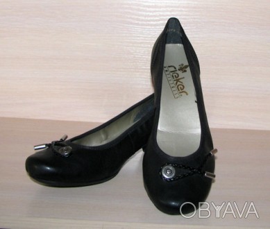 Новые элегантные туфли немецкой фирмы Rieker на удобном каблуке.

Бренд: Rieke. . фото 1
