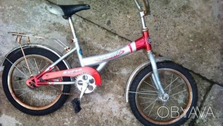 Продам детский велосипед в отличном состоянии.размер колес 16..нужен небольшой к. . фото 1