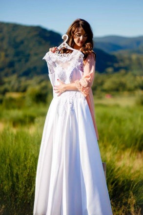 Продам весільну сукню білого кольору з карманами. Стан відмінний,після професійн. . фото 2