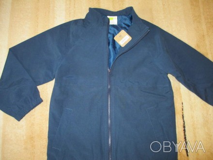 продам легкую куртку темно-синего цвета на мальчика 7-9 лет американского бренда. . фото 1