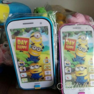 Продам дитячі сенсорні телефони (колір синій, жовтий і розовий), мова англійська. . фото 1