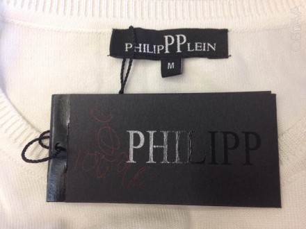 Свитер Philipp Plein цвета шампанского, украшен черными стразами в виде головы т. . фото 5