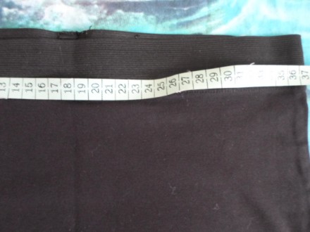 Фото 1-4 черная болоневая юбка ПОТ 38 см., ПОБ 48 см., длина 43 см. цена 55 грн.. . фото 7