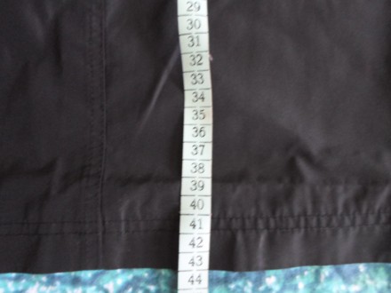 Фото 1-4 черная болоневая юбка ПОТ 38 см., ПОБ 48 см., длина 43 см. цена 55 грн.. . фото 5