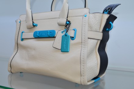 Нова оригінальна сумка Коач, шкіра натуральна

Carabiner-Hardware-Coach-Swagge. . фото 4